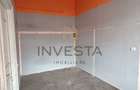 Apartament cu 2 camere cu terasa de 17 mp, tavan inalt, zona Centrala!