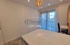 Apartament mobilat cu parcare subterana si terasa - 10