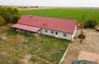 Casă cu teren 13 418 mp intravilan
