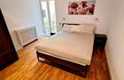 Vinzare apartament renovat cu design italian in  Piata Romana - 11