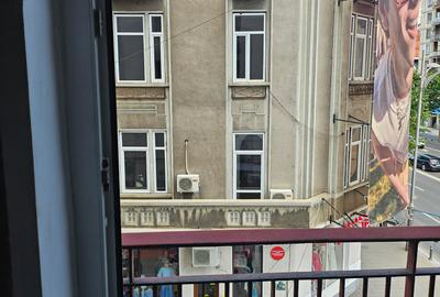 Bulevardul Magheru, Piața Romană - 14