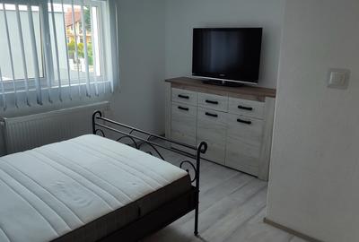 Se inchirieaza casa pe 2 nivele,duplex cu 3 camere,su 95mp,modern mobilat utilat - 4