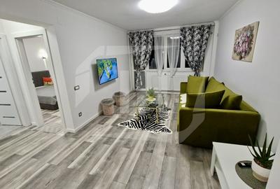 Apartament cu 3 camere semidecomandat, mobilat în Central