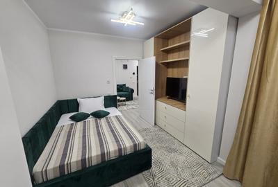 Apartament cu 3 camere semidecomandat, mobilat în Central