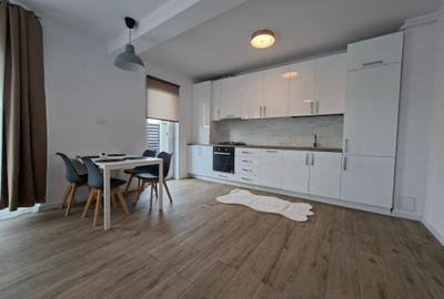 Bloc nou,  apartament   cu  parcare si curte proprie. - 1