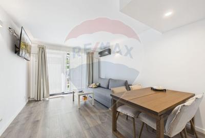 Apartament la parter ce are curte proprie ,  2 camere in Bloc nou - 11