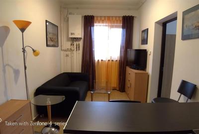 Apartament cu 2 camere semidecomandat, mobilat în Romană