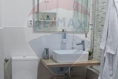 Apartament cu 3 camere de vanzare, centrala proprie - Mihai Bravu - 12