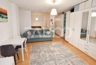 Garsoniera de vanzare 47 mp utili cu o mica gradina de 17 mp - 1