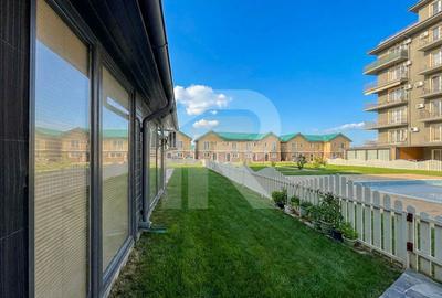 Apartament nou cu grădină 50mp, piscină și 3 locuri parcare incluse - 1