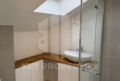 Piata Romana, mansarda boema, finisaje in linii simple si elegante - 9