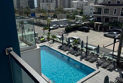 Apartament cu 3 camere semidecomandat, mobilat în Nord