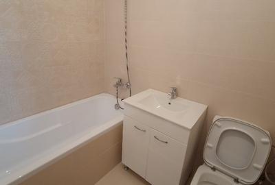 Vând apartament cu 2 camere, decomandat nou  + loc de parcare, situat in complex - 11