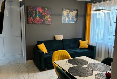 Apartament cu 2 camere semidecomandat, mobilat în P-ța Mihai Viteazul