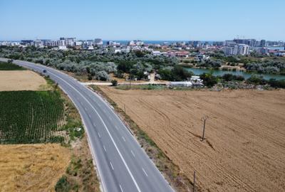 Teren cu 50 ml deschidere la DN Navodari-Lumina în drept cu zona Peninsula.