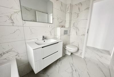 Apartament nou cu 2 camere - loc de parcare inclus - zona Braytim - 12