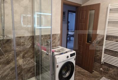 Apartament 3 camere decomandat , 2 bai ,105 mp cu balcon, Tractorul bloc nou - 12