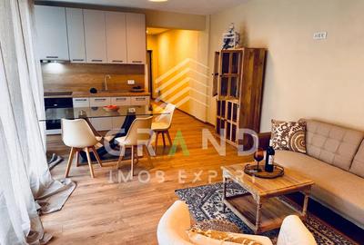 Apartament cu 3 camere semidecomandat, mobilat în Borhanci