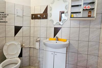Locuinta individuala(apartament 4 camere)+spatiu comercial si teren ,Darmanesti - 21