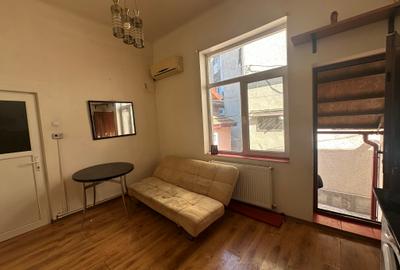 Studio - mezanin si demisol - Centru - 46.000 euro (Cod E8+E10) - 2