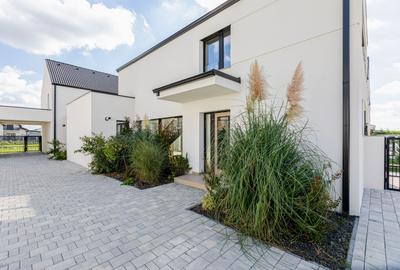 Casa Modernă cu Spații Vitrate Generoase - 3
