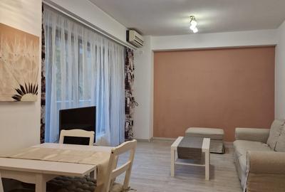 ASE -  Romana - Dorobanti - 2 camere - mobilat utilat  modern - centrala termica - 18