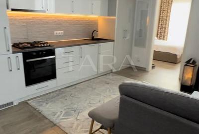 Apartament cu 3 camere semidecomandat, mobilat în Vest