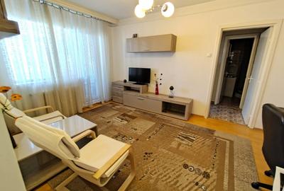 Apartament cu 2 camere semidecomandat, mobilat în Podu Roș