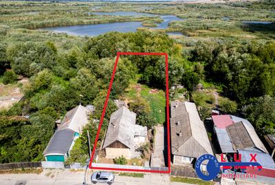 ID 7854 EXCLUSIVITATE – Teren cu casă și ieșire la canal - 2
