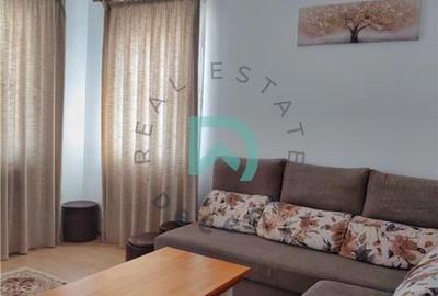 Apartament cu 3 camere decomandat în Tractorul