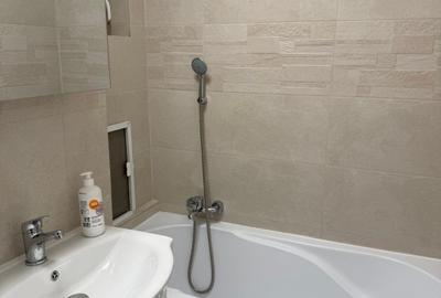 Apartament cu 2 camere semidecomandat, mobilat în Tei