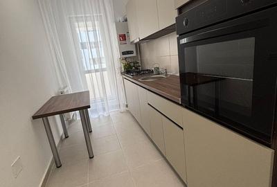 Garsoniera de inchiriat –Dotari: - TV +  loc  de parcare - 9