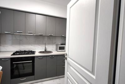 Apartament 1 camera mobilat, etaj 1, bloc NOU, statie autobuz CUG - VA - 5