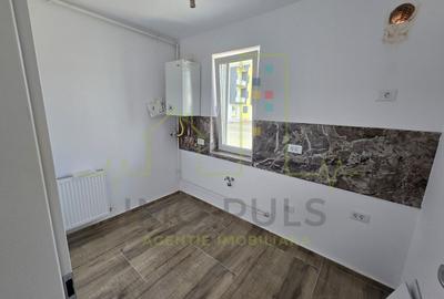 Apartament la parter cu balcon. Bucatarie separata. Loc de parcare - 2