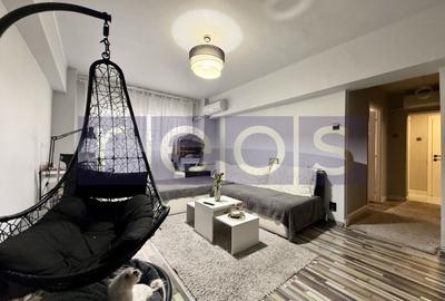 Apartament cu 3 camere semidecomandat, mobilat în Titan