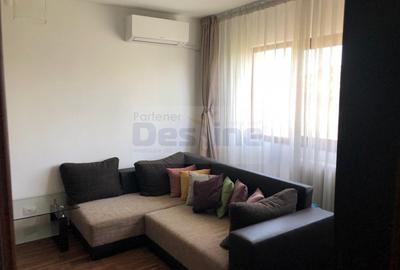 Apartament cu 2 camere semidecomandat, mobilat în Podu Roș