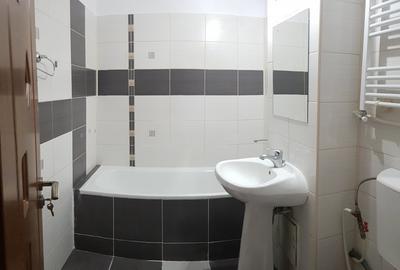 Apartament cu trei camere, decomandat, semimobilat, la parter, Bistrita Lac - 14