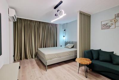 Garsonieră decomandată, mobilată în P-ța Victoriei