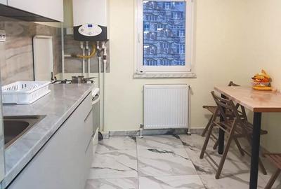 Apartament cu 3 camere decomandat, mobilat în Alexandru cel Bun