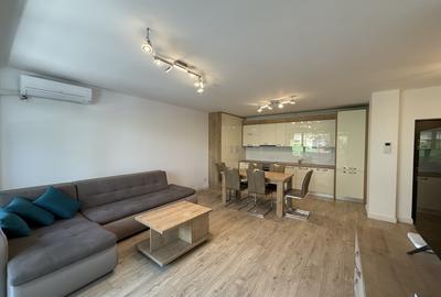 Apartament cu 3 camere open-space, mobilat în Girocului