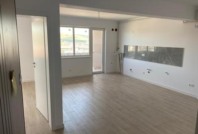 Vand apartament finisat cu 2 camere si balcon, pretabil birou