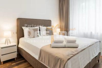 Apartament cu 2 camere decomandat în Tractorul