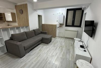 Apartament cu 2 camere semidecomandat, mobilat în Central