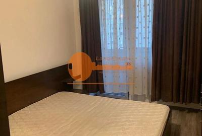Apartament cu 3 camere semidecomandat, mobilat în Mihai Bravu