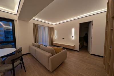 Apartament cu 2 camere semidecomandat, mobilat în Central