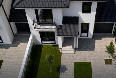 Duplex modern în Dumbrăvița despărțit prin garaj - 5 camere + garaj - 2