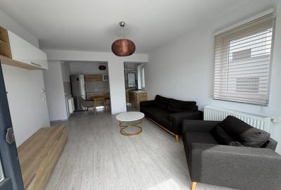 Apartament cu 2 camere semidecomandat, mobilat în Tractorul