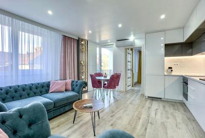 Apartament cu 3 camere semidecomandat, mobilat în Central