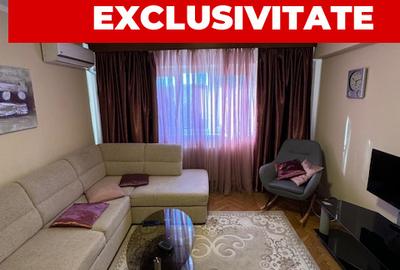 Apartament cu 3 camere semidecomandat, mobilat în Central