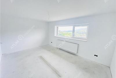 Casa individuala in Cisnadioara cu 4 camere 2 bai terasa teren 1170 mp - 4
